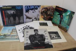 A fifteen album lot as in photos , decent selection of rock , pop and more on offer here , sleeves