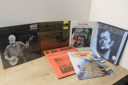 A Sixteen Album lot of early blues , folk and world music related titles VG+/VG+ in general - good