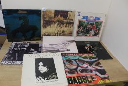 A fifteen album lot as in photos , decent selection of rock , pop and more on offer here , sleeves