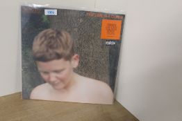 A Kae Tempest ' signed ' limited edition orange vinyl album