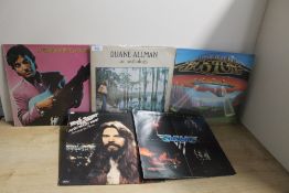 A ten album lot with Ry Cooder , Aerosmith , Boston and more on offer on here - classic selection in