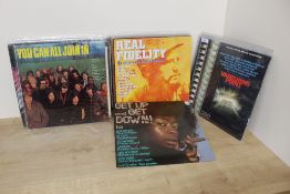 A lot of 35 mixed records as in photos , many genres with rock , pop and more - some excellent