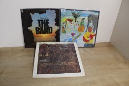 A lot of three albums by The Band - highly influential and backed Bob Dylan - recommended