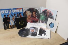A lot of Blondie records , as in photos - 12 inch singles - picture discs and more on offer here ,