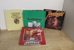 A ZZ Top lot with 6 albums on offer here - their early ones are getting hard to find - great Texan