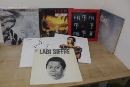 A fifteen album lot as in photos , decent selection of rock , pop and more on offer here , sleeves