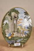 A mid 18th-century majolica style oval plaque, possibly Castelli by Nicola Cappelletti,depicting a