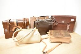 Five leather bags comprising three frame structured handbags, a cocoa brown Waldybag, a taupe Made