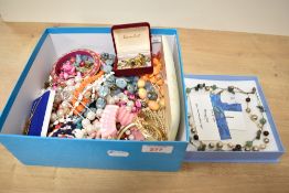 An assortment of costume jewellery, including faux pearls, beaded jewellery and cufflinks