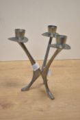 A mid 20th-century Norwegian Brodrene Mylius pewter triform candlestick, of modernist design, in