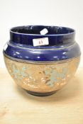 A large early 20th-century Royal Doulton Slaters Patent stoneware jardinière, of bulbous form with a