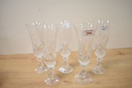 A selection of five Cumbria Crystal 'Keswick' style champagne flute glasses, featuring long