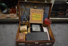 A mixed selection of 19th and 20th-century photographic ephemera of slides and transparencies in a