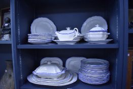 A selection of 19th-century Spode pearlware featuring a blue feathered-edge design, including