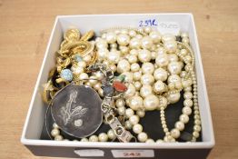 An assortment of costume jewellery, including faux pearls, a semi-precious stone bracelet and clip