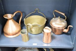 A selection of late 19th to 20th-century copper and brassware, including a copper harvest jug,