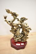 A modern Chinese resin gilded dragon statue, possibly a Feng Shui figurine, unmarked, 35.5cm.
