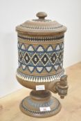 A late 19th-century Doulton Lambeth stoneware water filter with spigot, of cylindrical form upon a