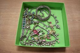 An assortment of paste set jewellery, including bracelets, necklaces and brooches