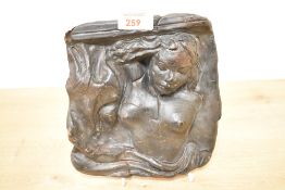 A contemporary Auguste Rodin-style terracotta sculpted bust plaque, depicting a reclining female