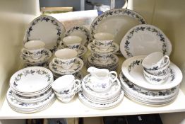 A selection of 20th-century Royal Doulton English translucent china Burgundy pattern dinner wares,
