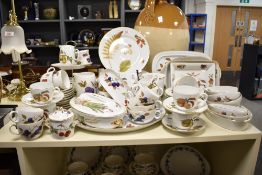 A large collection of Royal Worcester fine porcelain Evesham and Wild Harvest dinner wares,