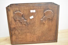 A 20th-century wooden document holder, featuring distinct hand-carved detailing of a fan-like motif,