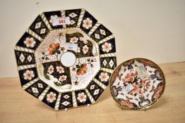 A 20th-century Royal Crown Derby bone china octagonal plate, pattern 2451, featuring Imari-style