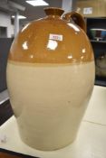 A large stoneware flagon having impressed marks for 'G Braithwaite Jn Wine & Spirit Merchant