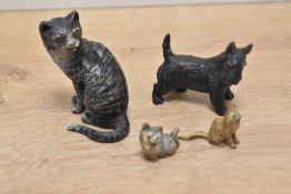 A late 19th to early 20th-century Austrian cold-painted bronze cat with glass eyes, in a sitting