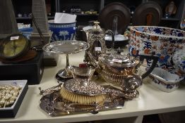 A collection of 20th-century silver plate and white metal ware, to include an ornately decorated