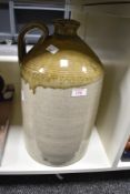 A large 19th to early 20th-century, hand-thrown stoneware flagon, with a two-toned coloured glaze, a