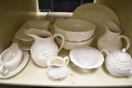 A late 20th century St Michael part tea / dinner service, having a textured foliage pattern on a