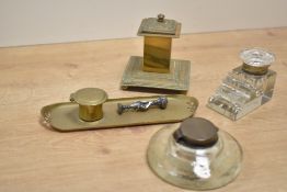 A mixed late 19th to early 20th-century group of inkwells, to include a German Art Nouveau brass