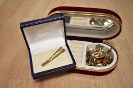 A small assortment of cufflinks, pin badges and earrings etc.