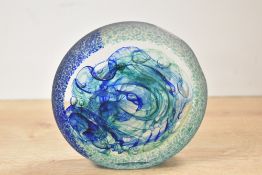 A 20th-century Jane Charles studio glass New Weight, featuring a free-blown disc-shaped form in