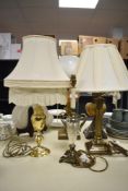 A selection of three 20th-century table lamps, to include: a brass-effect metal Corinthian example