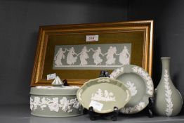 A selection of five 20th-century Wedgwood green jasperware items, to include: a framed Dancing Hours