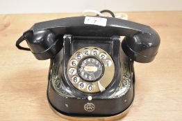 A vintage rotary bell telephone, 13cm.
