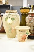 Two modern decorative stoneware pots, comprising a larger baluster-form vase with twine detailing to