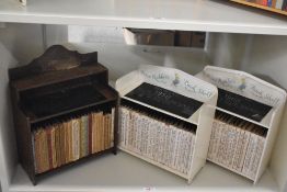 Beatrix Potter. Three vintage Peter Rabbit's Book Shelf units, each housing a set of the twenty-