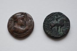 A Bronze Kushan Empire India 1st Century AD, Obv Figure Standing looking Left, Rev Horse And