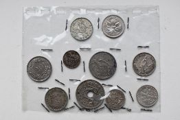 World Silver Coinage Comprising An Australian 1936 Threepence, 1959 Sixpence, 1967 Five Cents, A