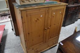 A vintage natural pine tallboy, dimensions approx. H112 W93 D54cm