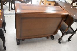 An early to mid 20th Century oak gateleg table having full length leaves, width approx. 89cm