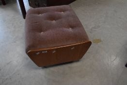 A vintage stylised teak foot stool having dralon upholstery , width approx. 62cm