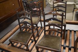 A set of four 20th century oak ladder back chairs, with dralon covered drop in seats, seat height