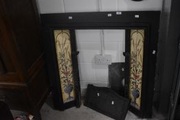 A reproduction cast and tiled fire surround etc
