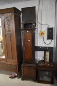 An 18th Century oak long cased clock having eight day movement with square hood and brass dial named