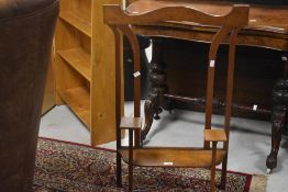 An Arts & Crafts golden oak firescreen frame, height approx. 87cm